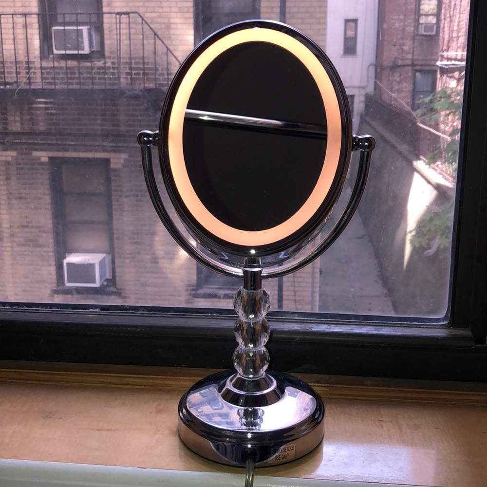 Makeup mirror with light